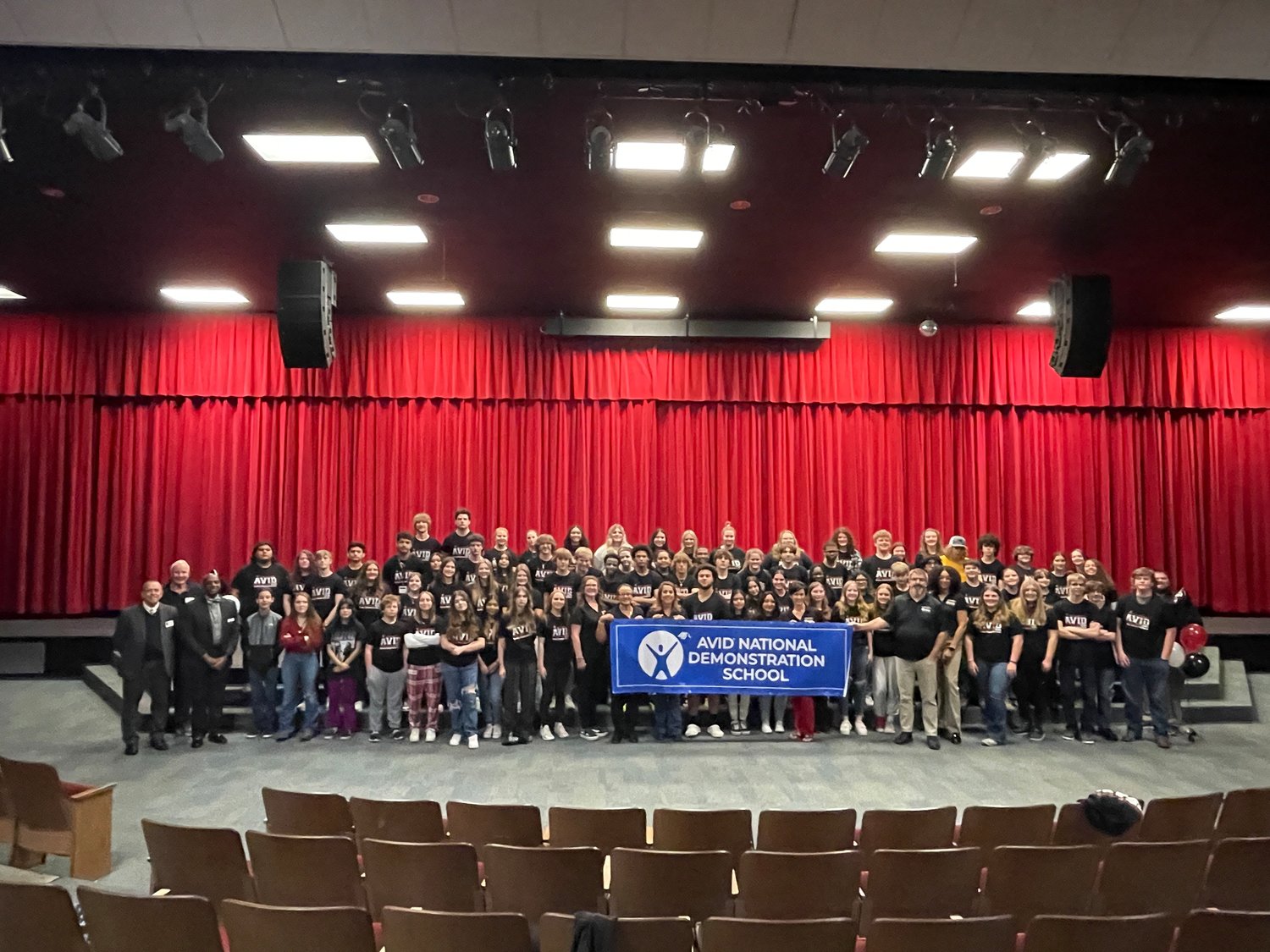 Students and staff at Chatham Central High School's AVID program pose in the school's auditorium alonside the Chatham County Board of Education on Dec. 13. CCHS was recognized as an AVID National Demonstration Site for its continued success using AVID strategies.